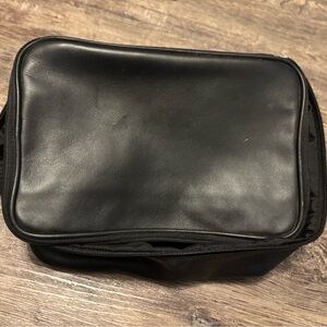 Black Leather Womens makeup bag. Coach